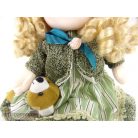 Felhúzható zenélő baba